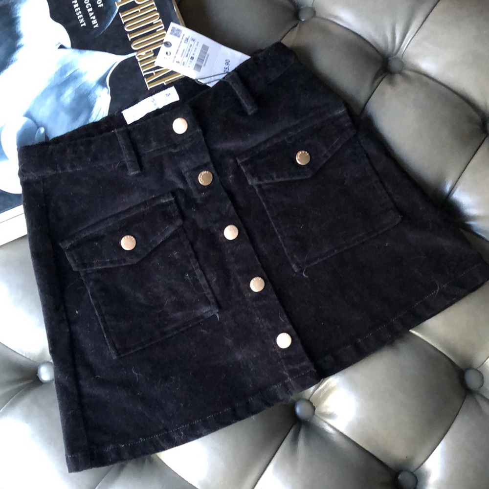 Azzara’s girls black suede skirt